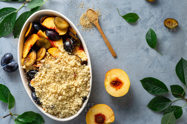 Overhead view raw ingredients for cooking plum peach pie