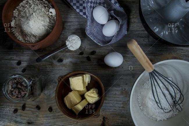 Ingredients of a sorgho cake on a rustic wooden background