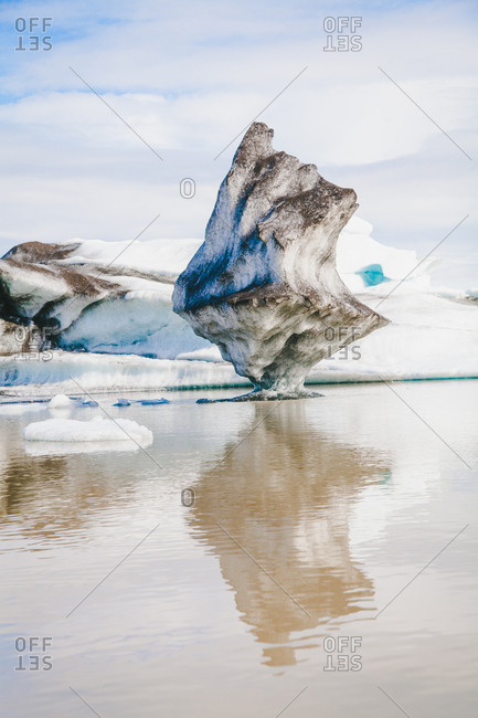 Glaciers reflecting in the water in rural Iceland