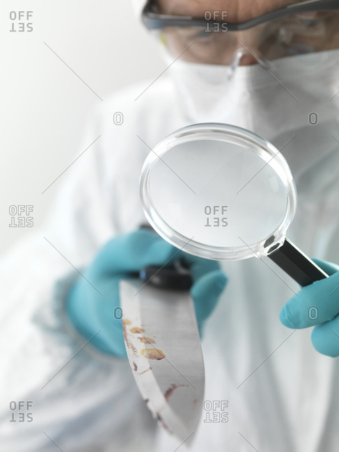 magnifying spectacles stock photos - OFFSET