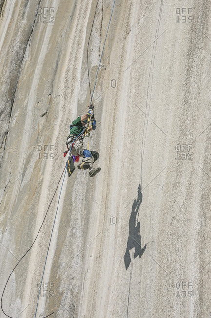 Adaptive climber pulling up on El Capitan