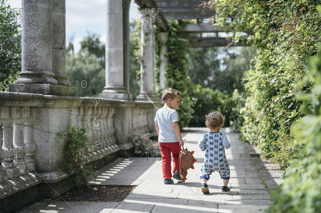 July 15, 2019: UK - London - Children walking at the pergola in Hampstead heat