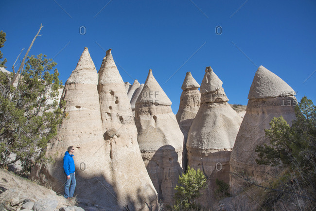 Man admiring sandstone towers in Kasha-Katuwe Tent Rocks National Monument, New Mexico