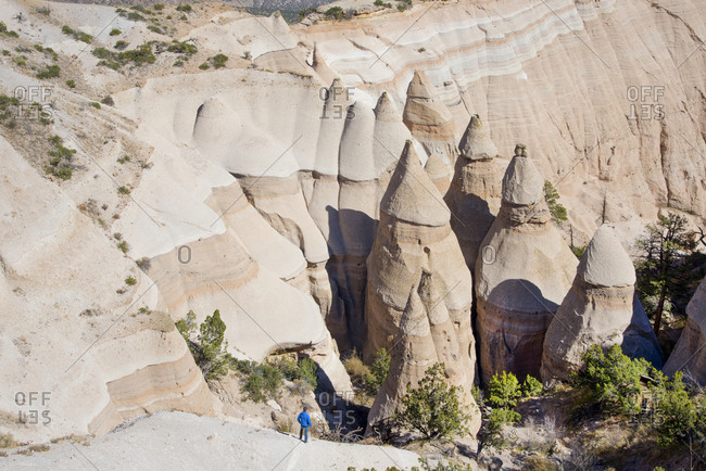 Man admiring sandstone towers in Kasha-Katuwe Tent Rocks National Monument, New Mexico