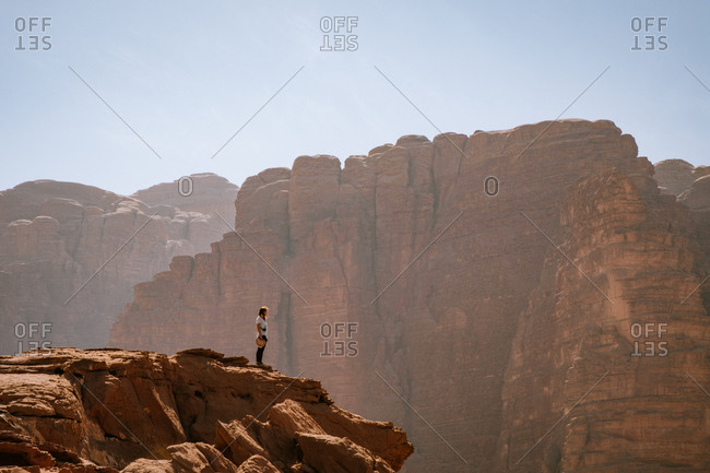 Woman on top of a rock in wadi rum