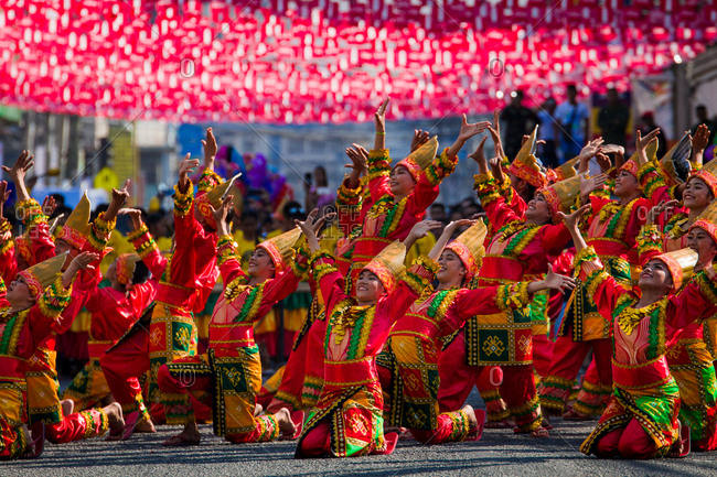 Davao, Philippines - November 13, 2018: Performers at the annual Kadayawan Festival dancing in bright costumes
