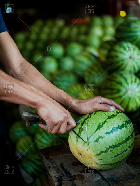 Watermelon being sliced in a market in the Philippines