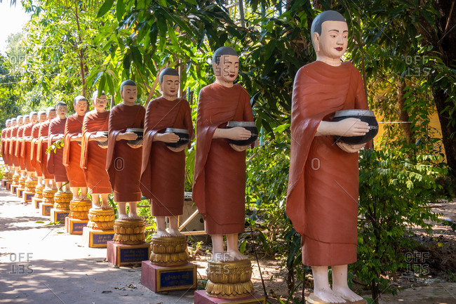 November 3, 2018: Row Of Buddhist Monk Statues In Cambodia Temple Siem Reap
