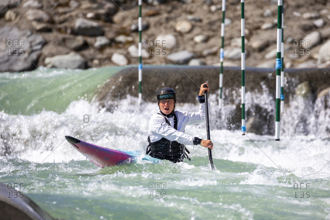 Canada, British Columbia, Pemberton - May 18, 2019: Olympic hopeful kayaker trains at the rutherford whitewater park.