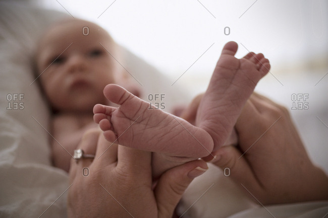 Close up of a newborn baby's feet.