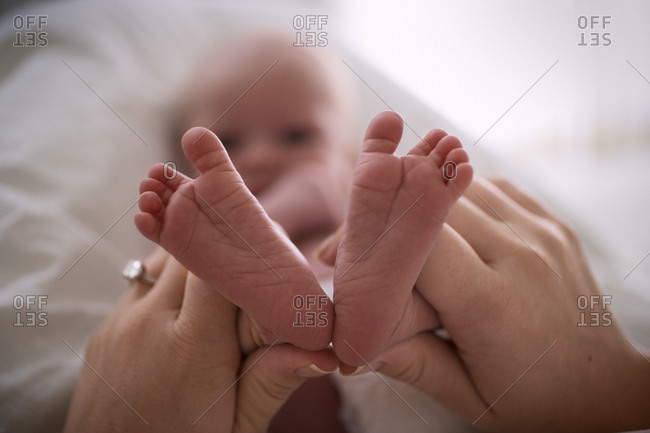 Close up of a newborn baby's feet.