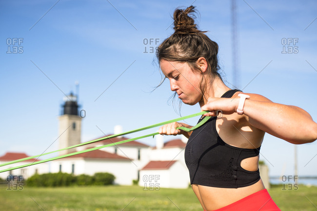 Young Woman Working Out - Offset