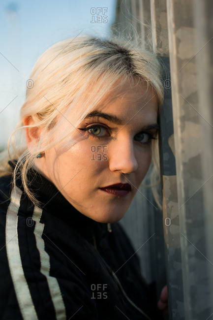 Young woman with urban clothes