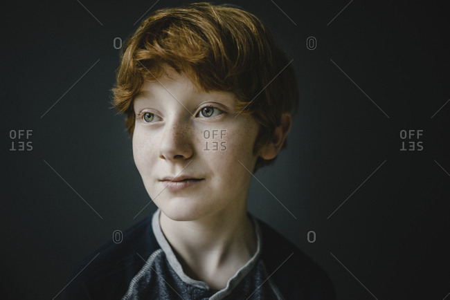 Portrait of redheaded boy with freckles