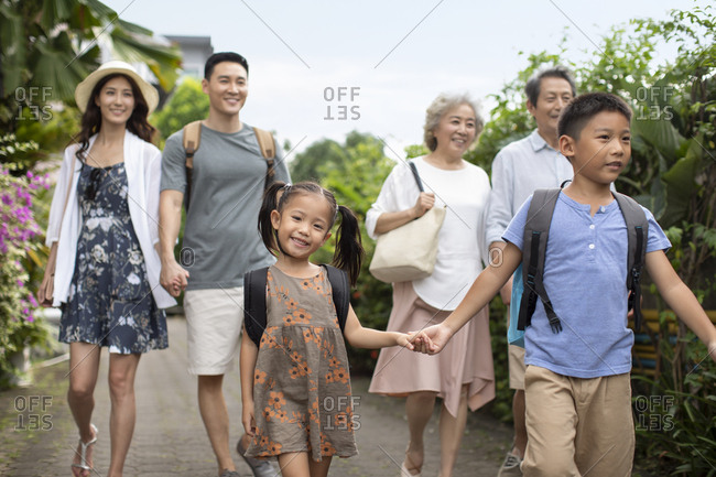 Happy Chinese family enjoying vacation