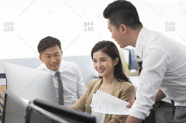 Chinese business people working in office