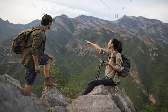 Young couple hiking outdoors