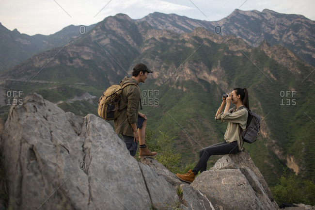 Young couple hiking outdoors