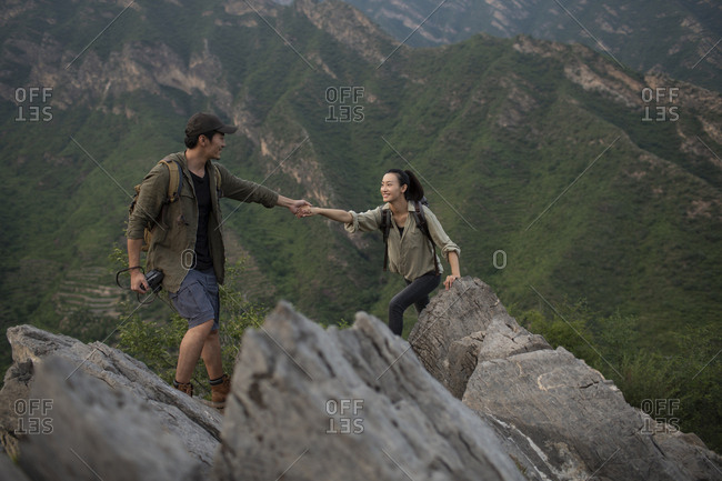 Young couple hiking outdoors