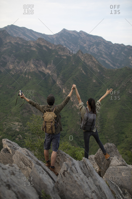 Young couple hiking outdoors
