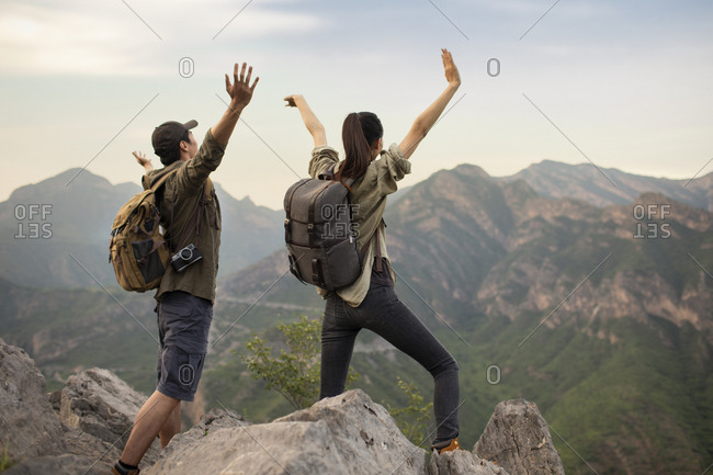 Young couple hiking outdoors