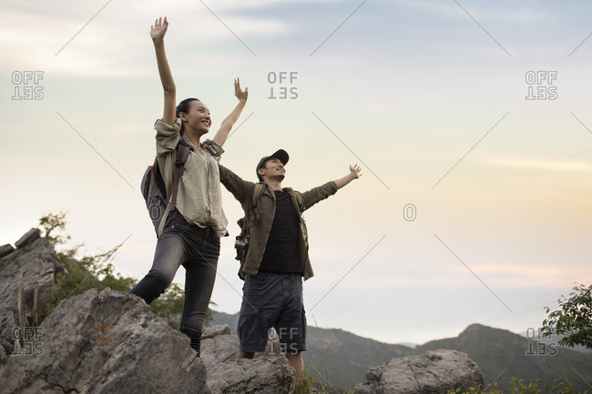 Young couple hiking outdoors