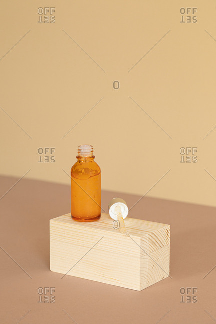 Minimalistic composition of natural soaps on wooden cubes.