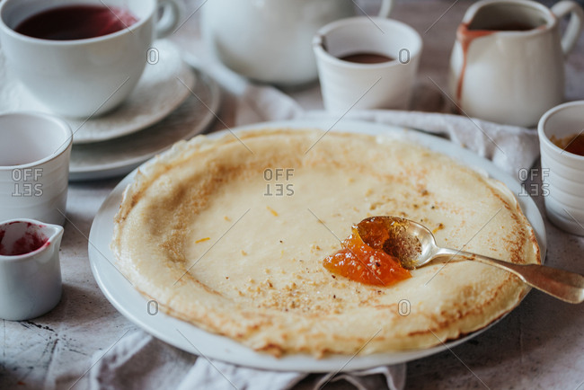Traditional Serbian crepes with apricot jam
