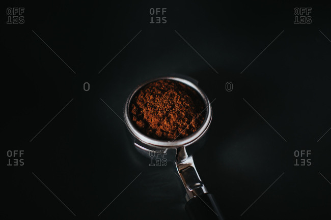 Coffee grounds in an espresso filter ready to be prepared into an espresso shot