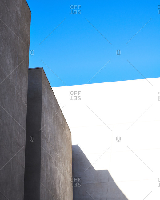 Minimal hard light texture exteriors of buildings in San Diego, California showing blue sky above