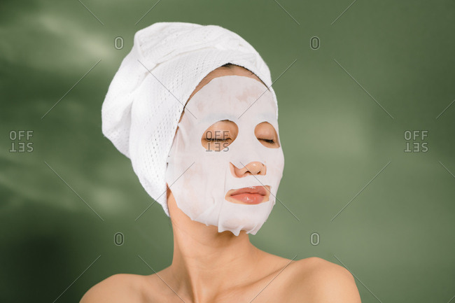 Woman relaxing with a face mask