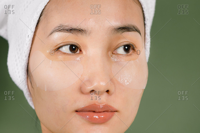 Close up of young woman wearing eye mask