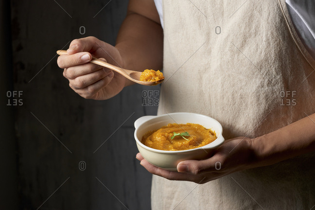 Close up of freshly made pumpkin soup served in a bowl