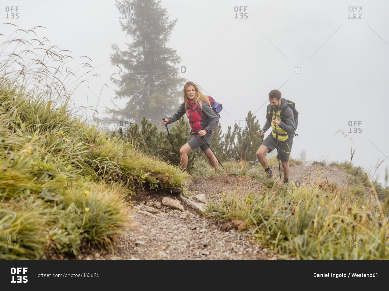 Young couple on a hiking trip in the mountains- Herzogstand- Bavaria- Germany