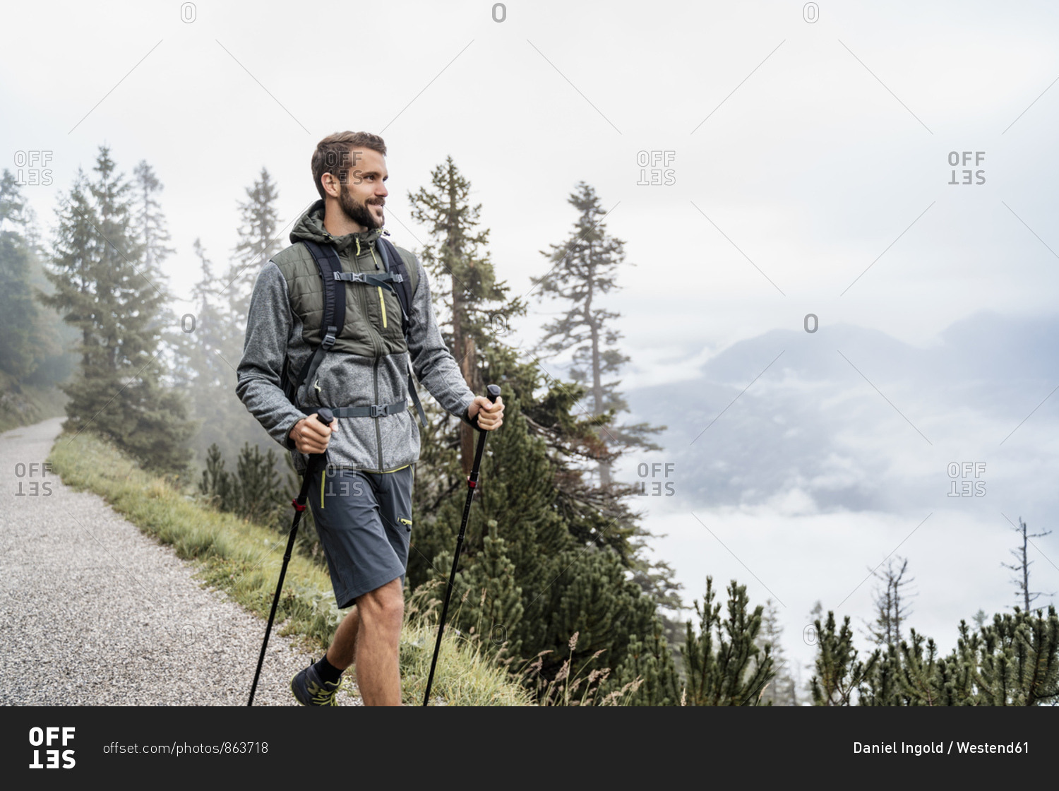 Young man on a hiking trip in the mountains- Herzogstand- Bavaria- Germany