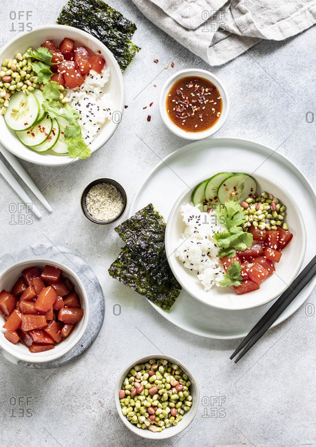 Sauteed watermelon poke bowl served with rice, cucumbers, and sprouted adzuki, lentil and beans