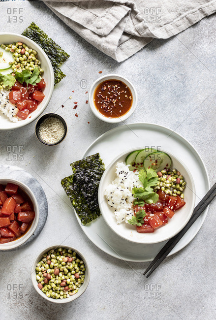 Sauteed watermelon poke bowl served with rice, cucumbers, and sprouted adzuki, lentil and beans