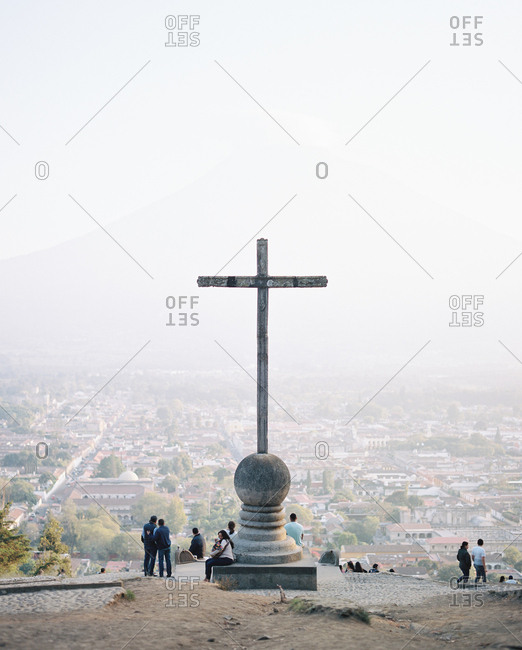Antigua, Guatemala - January 17, 2019: Hill of the cross overlooking city on foggy morning