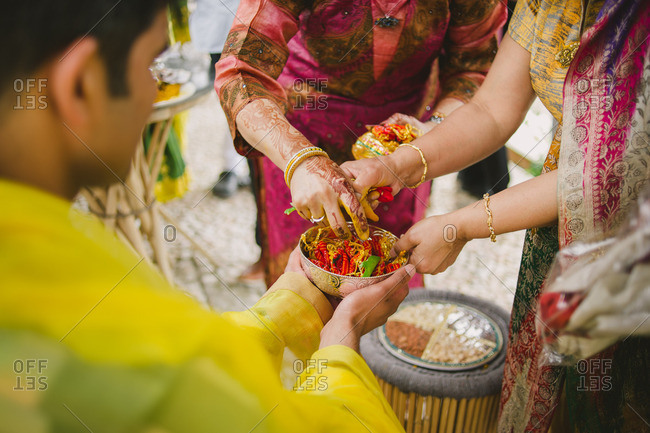 Women during a pre-wedding ritual of a Hindu wedding