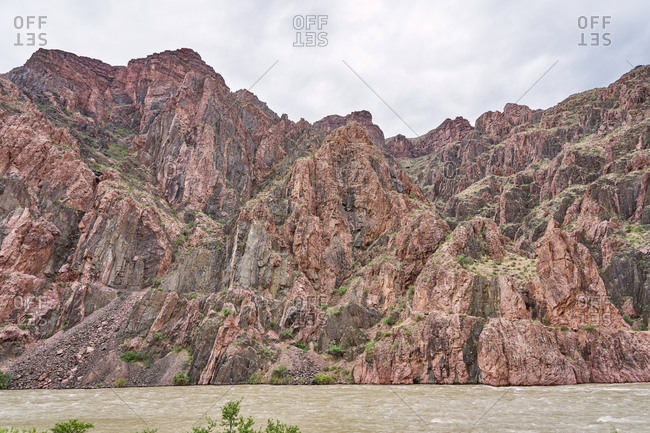 Colorado river surrounded by beautiful canyons in Grand Canyon National Park, Arizona