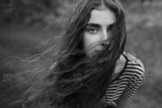 Portrait of windswept young woman