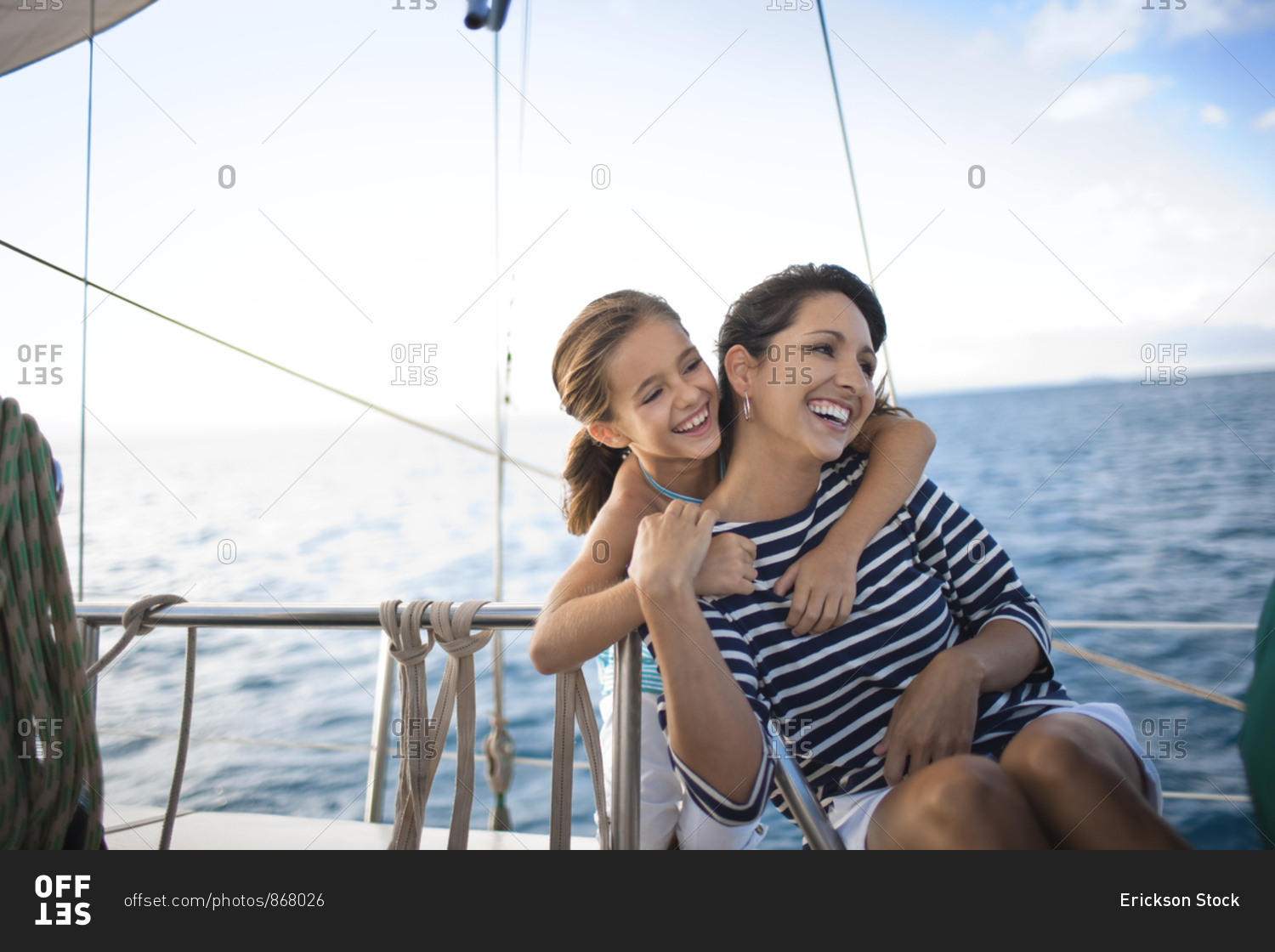 Mother and daughter on sailboat