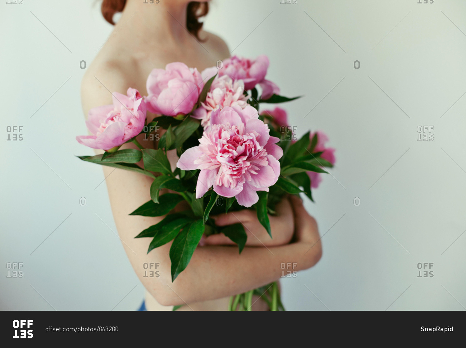 A Person Holding Peony Flowers in a Brown Paper Bag · Free Stock Photo