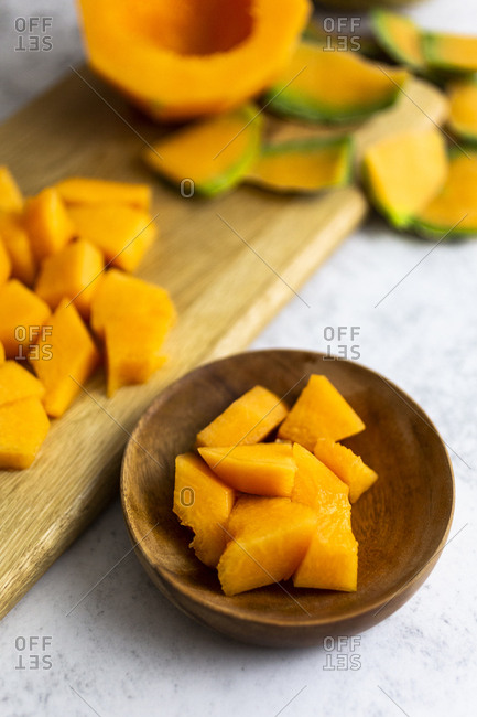 High angle view of cantaloupe slices in plate on table