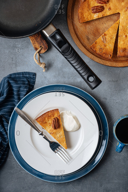 Piece of banana skillet cake served on a plate