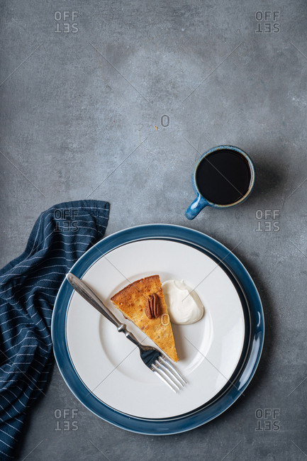 Overhead view of a piece of banana skillet cake served on a plate