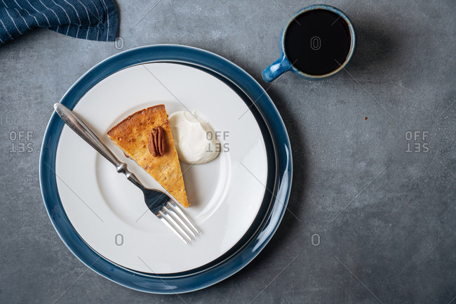 Top view of a piece of banana skillet cake served on a plate
