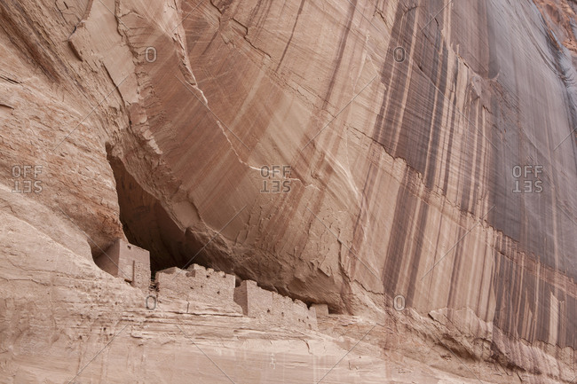 Prehistoric ruins built into a cliff in Canyon de Chelly, Arizona.