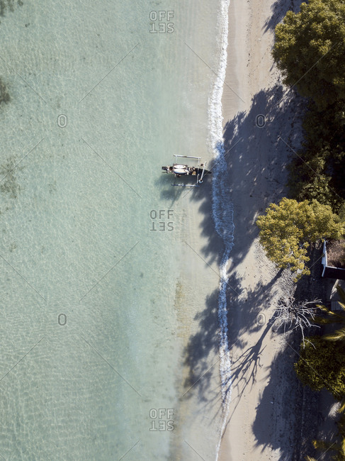 Aerial view of boat with surfboards, Sumbawa, Indonesia