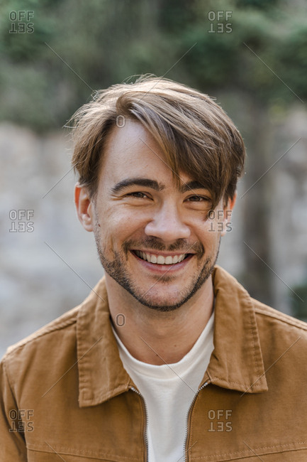 Portrait of smiling man with stubble